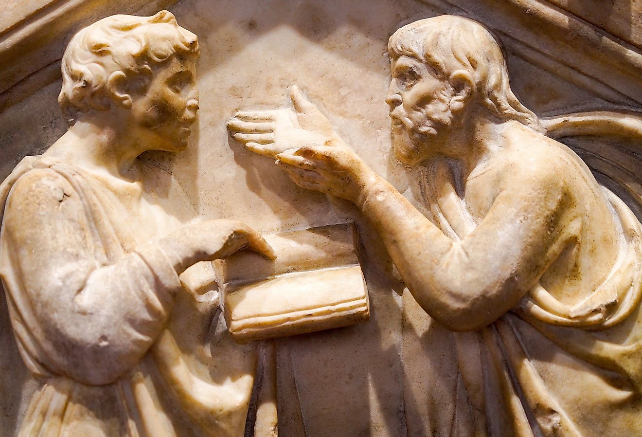 Low relief sculpture depicting Plato and Aristotle arguing by Andrea Pisano, adorning the external wall of Florence Cathedral. Image credit Krikkiat via Shutterstock