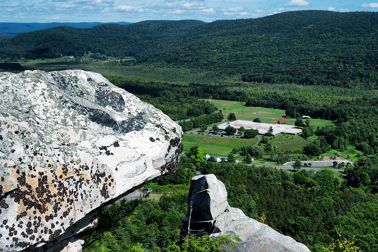 Rocky outcroppings covered in lichen on top of monument mountain in Great Barrington, Massachusetts. 