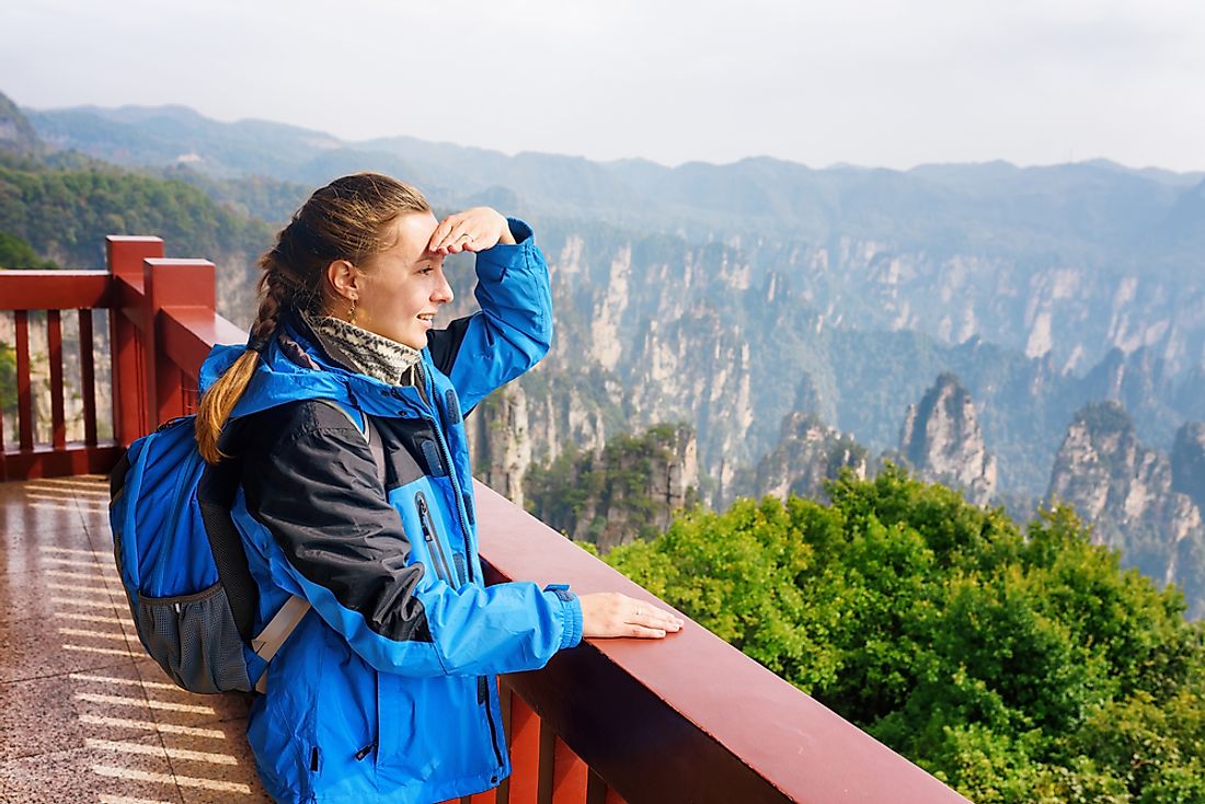 Tourists visit China to explore its vibrant cities and breathtaking scenery. 