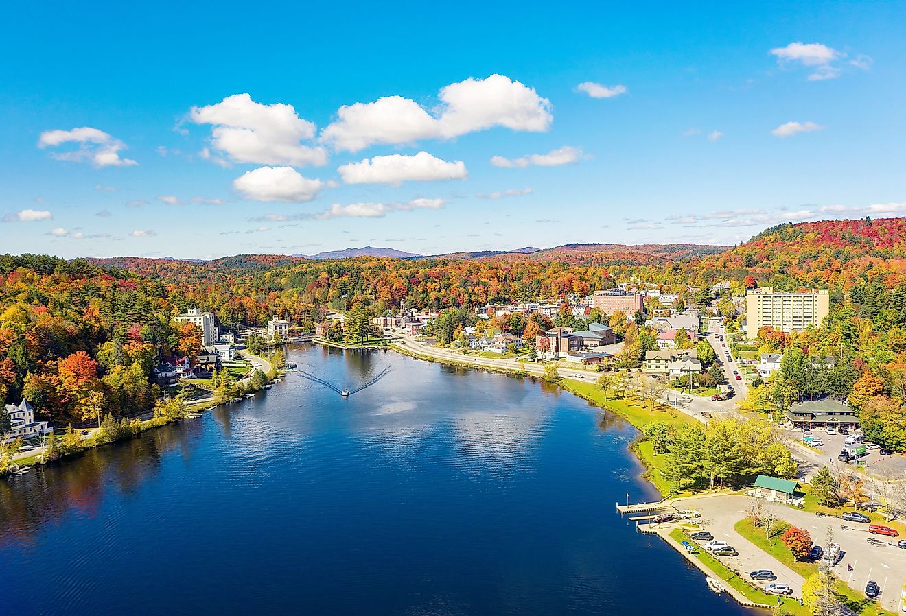 Colorful aerial view of Saranac Lake New York in the Adirondack Mountains during the fall.