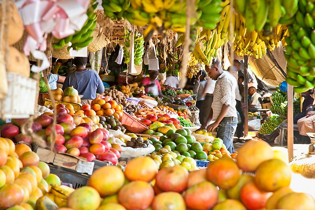 Street vendors selling local fruit in Nairobi, Kenya.  Editorial credit: Aleksandar Todorovic / Shutterstock.com.