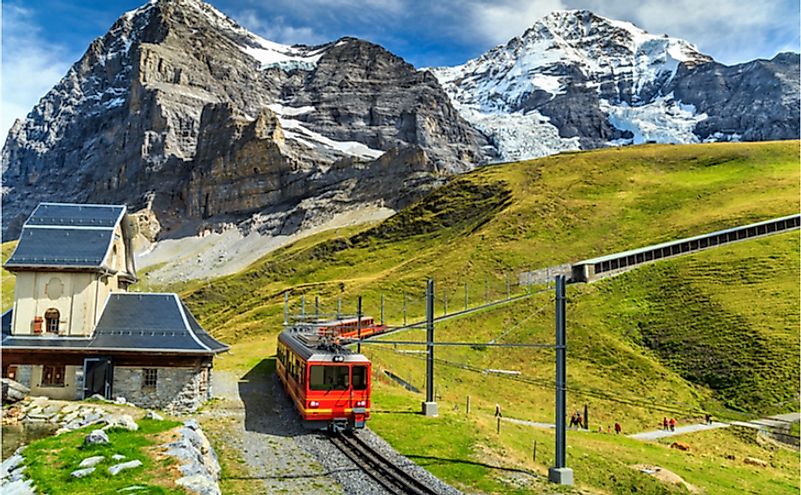 Famous electric red tourist train coming down from the Jungfraujoch station.