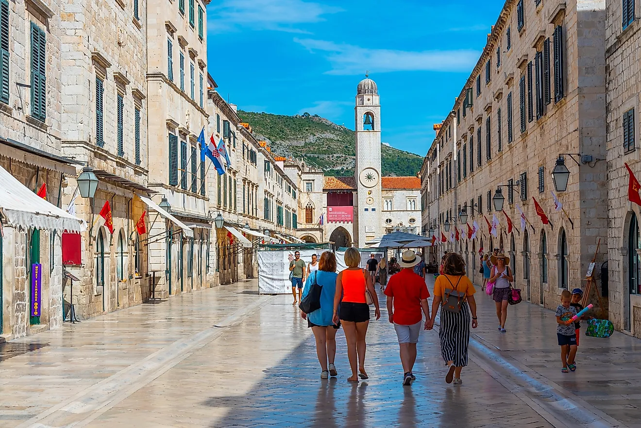 People are strolling through Stradun street in Dubrovnik, Croatia. Image credit: trabantos / Shutterstock.com.
