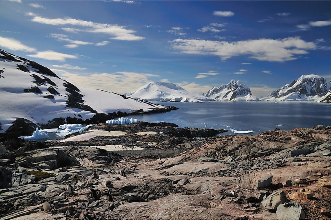 Many islands in Antartica are covered in ice and uninhabitable. 