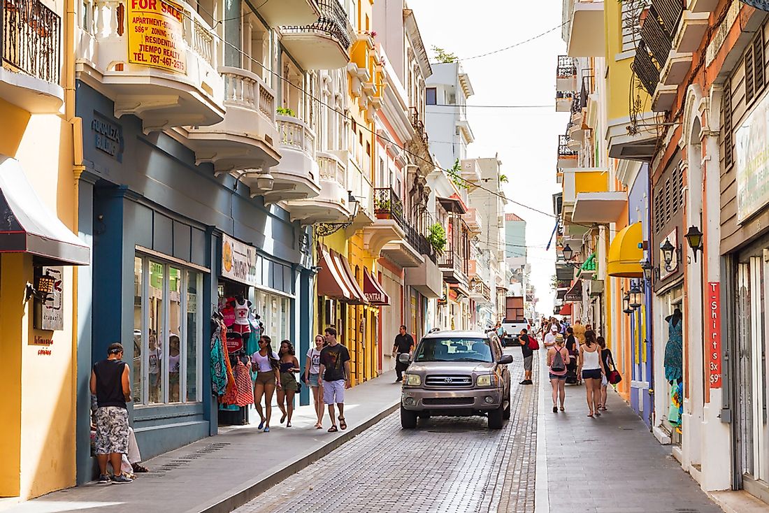 Shoppers on a street in San Juan. Editorial credit: Dennis van de Water / Shutterstock.com. 