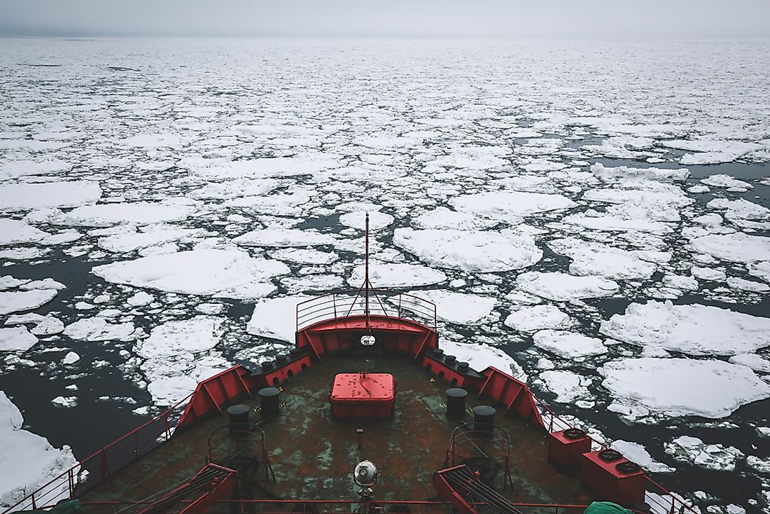 An ice breaker going through the Arctic. 