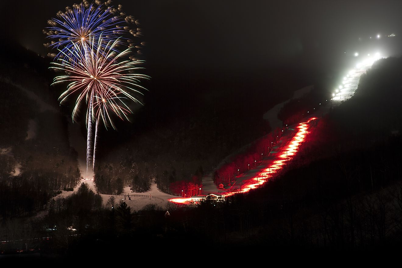 Fireworks over Stowe Mountain Resort, Stowe, Vermont, USA.  Via Shutterstock / Don Landwehrle.