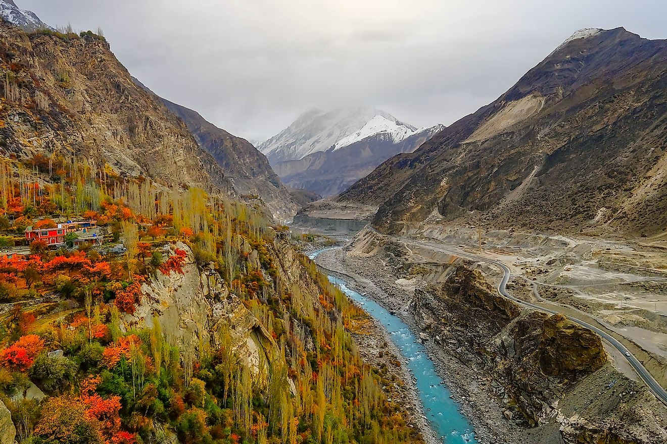 Karakoram range, with a view of Hunza river and forest trees in autumn season, Gilgit Baltistan, Pakistan.