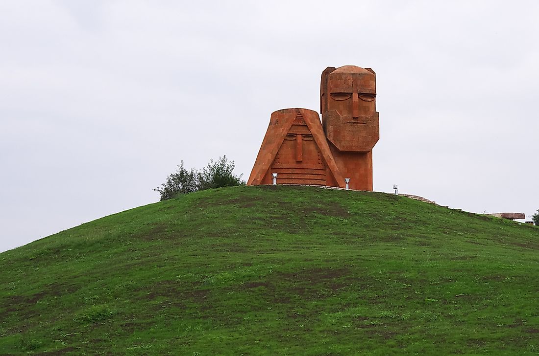 The famous "We Are the Mountains" sculpture in the Republic of Artsakh. Editorial credit: Igor Dymov / Shutterstock.com. 