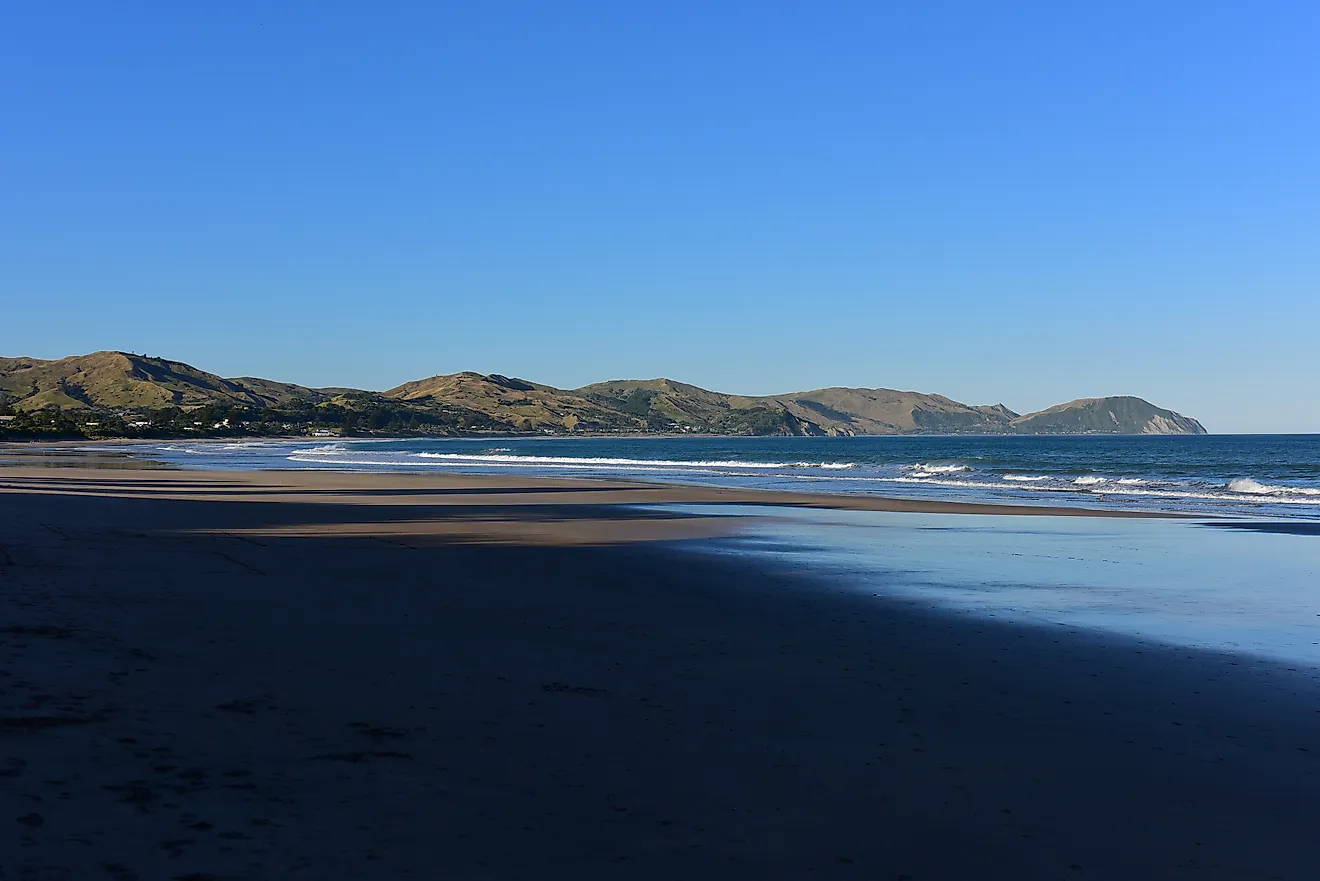 Wainui Beach with great view of nearby mountain ridges in Gisborne, Hawkes Bay, New Zealand. 
