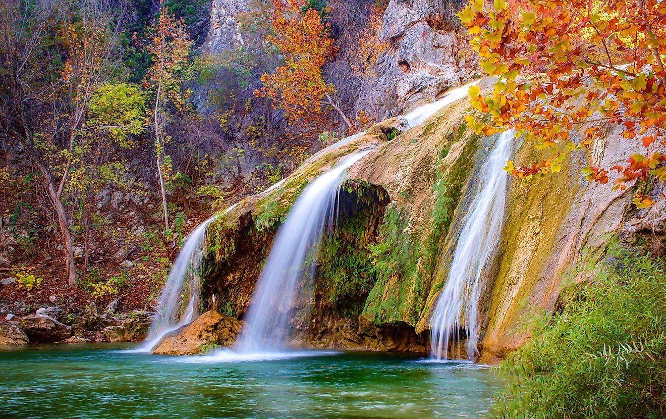 Color photograph of Turner Falls waterfall near Davis, Oklahoma during fall. 