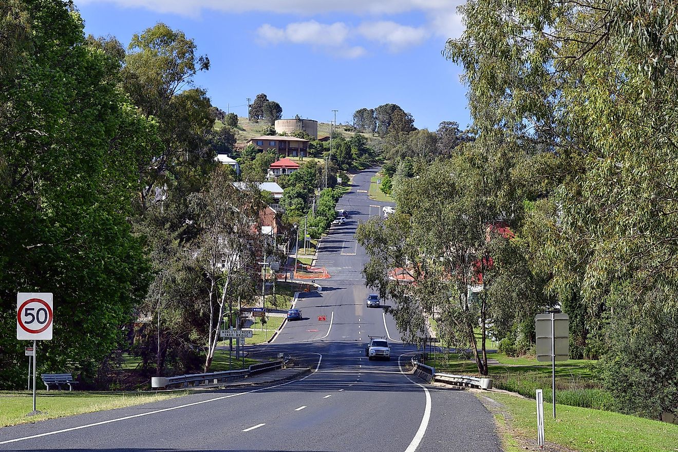 Gundagai, New South Wales: Cars on street and bridge over Morleys creek