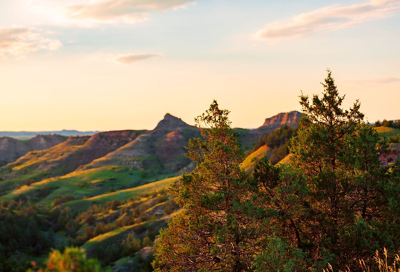 The sun sets over Scoria Point Overlook in Theodore Roosevelt National Park near Medora, North Dakota