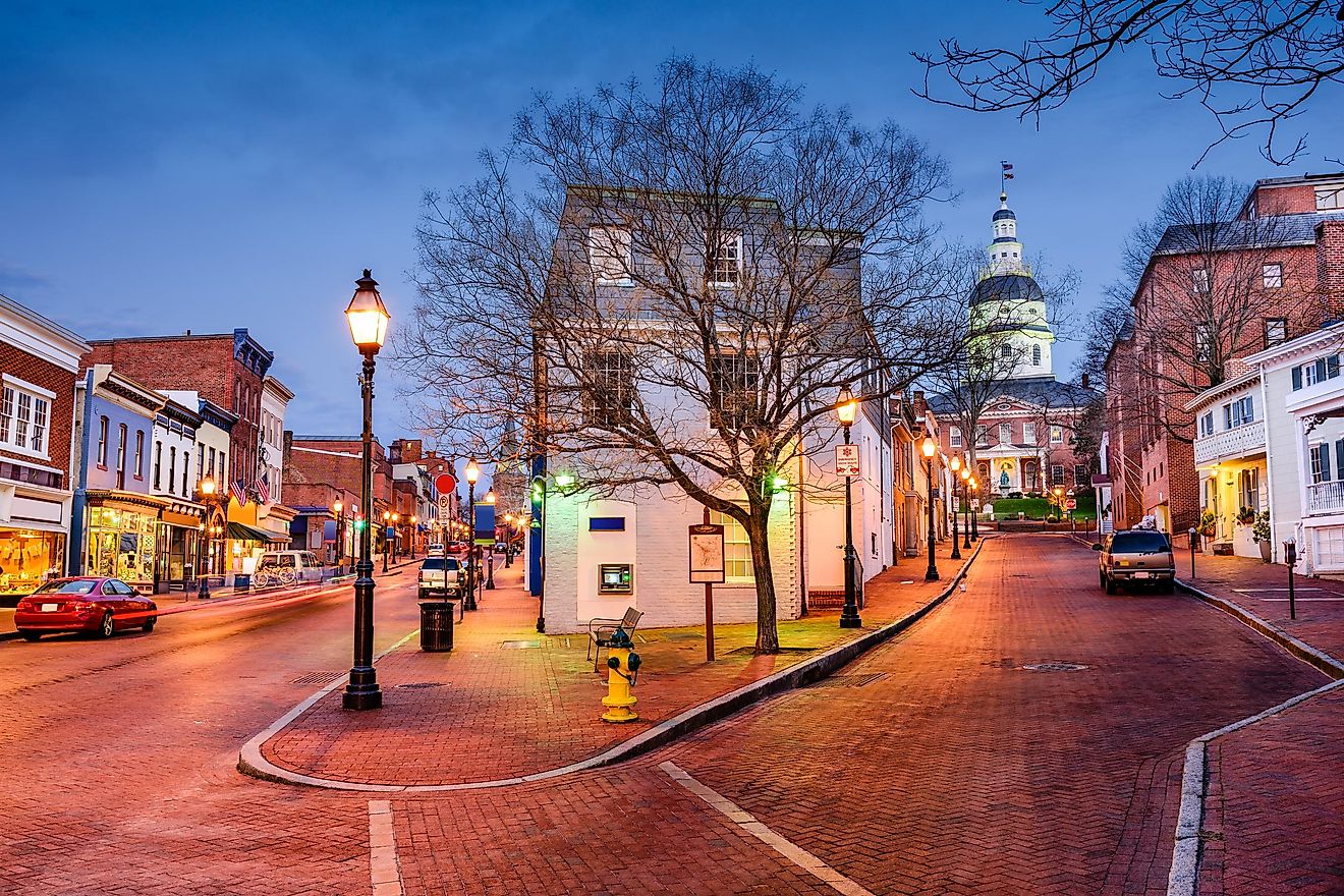 Downtown cityscape of Annapolis, Maryland, USA, on Main Street at twilight.