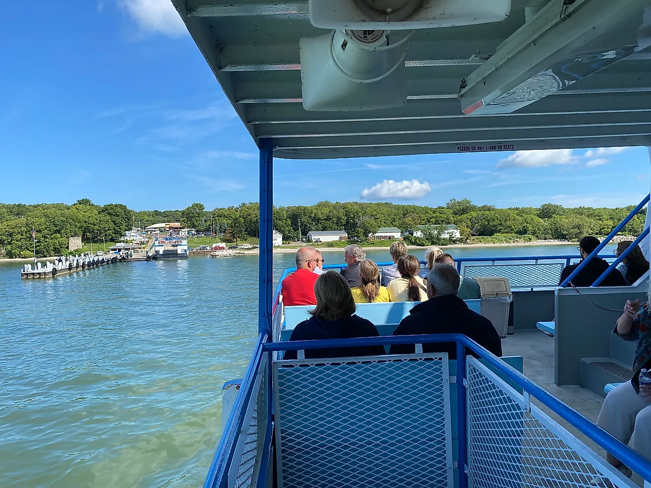 Passengers aboard the Miller Ferry watch as it approaches the docks at South Bass Island, aka “Put-In-Bay”.  Photo credit: Andrew Douglas