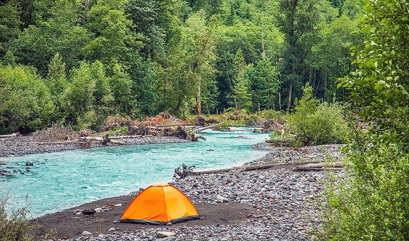 Tent on the Nisqually River in Mount Rainier National Park. Image credit: SchnepfDesign/Shutterstock.com