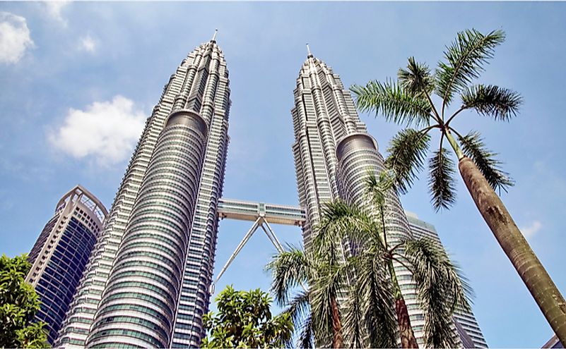 Twin towers Petronas and sky bridge at Kuala Lumpur, Malaysia. Editorial credit: DiPetre / Shutterstock.com