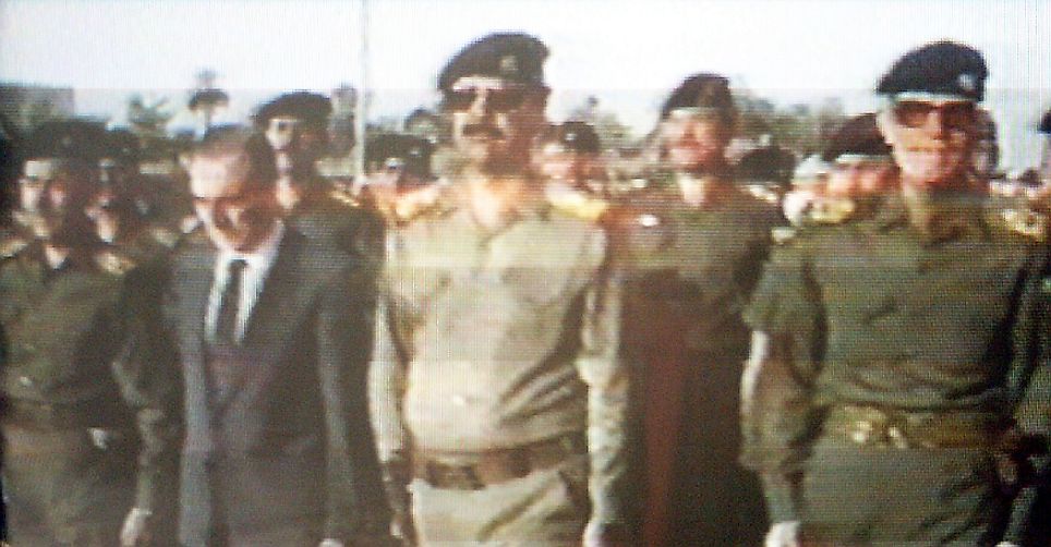 Iraqi and Syrian Ba'athist leaders during the funeral of Michel Aflaq in 1989.