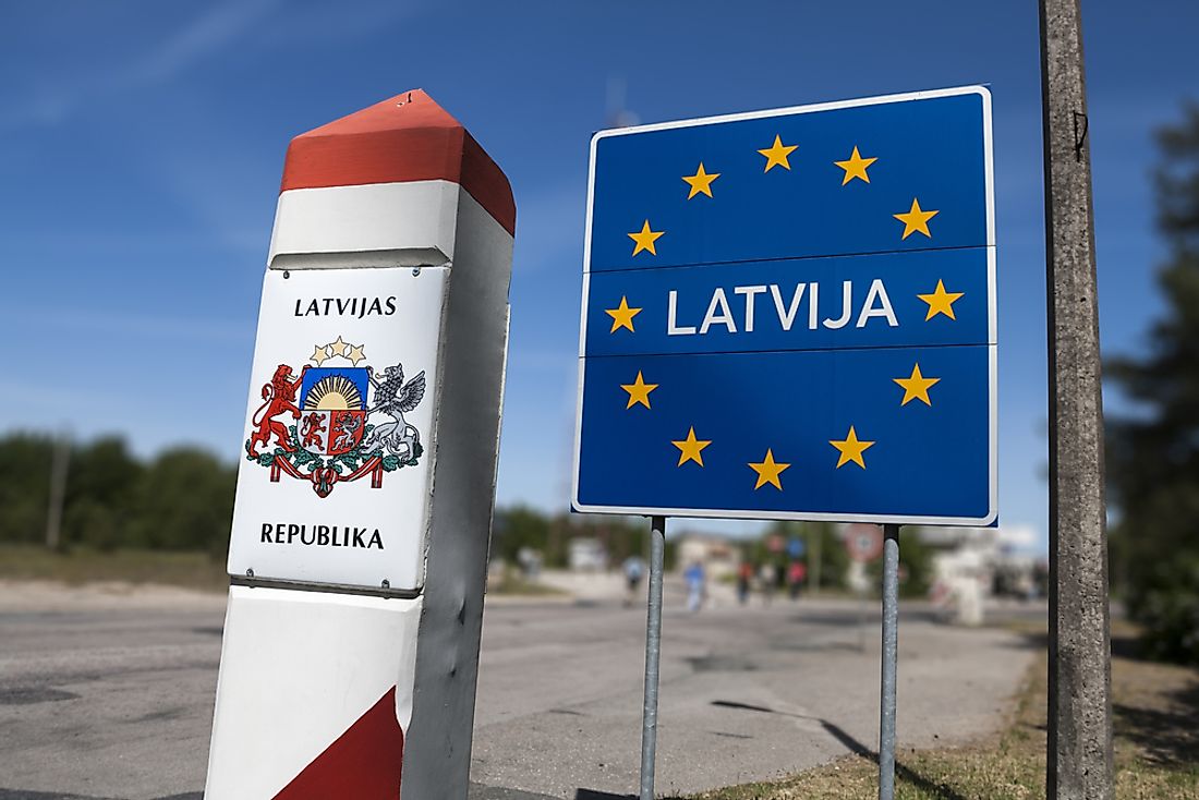 Sign demarcating the boundary between Latvia and Lithuania.