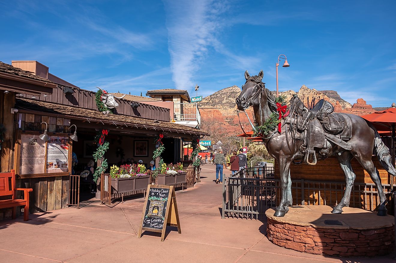 Busy Main Street in Sedona, Arizona. Cowboys Club visible.Editorial Photo Credit: Jeff Whyte Shutterstock.