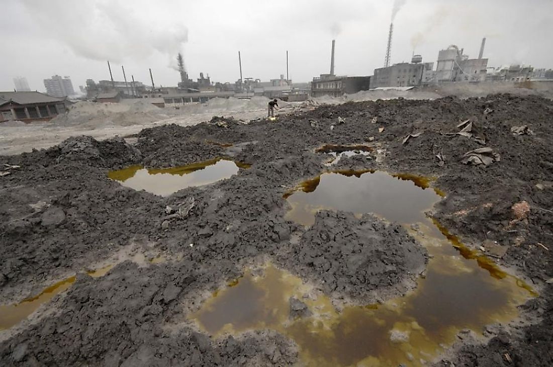 Chemicals from factories polluting the soil and groundwater. 
