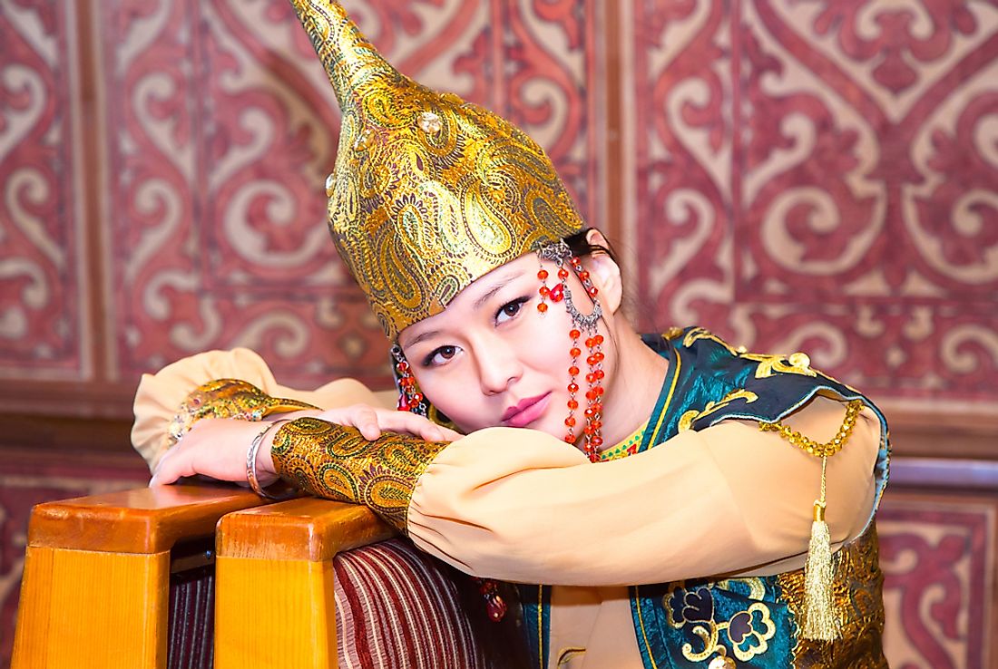 A woman wearing a traditional national costume of Kazakhstan. 