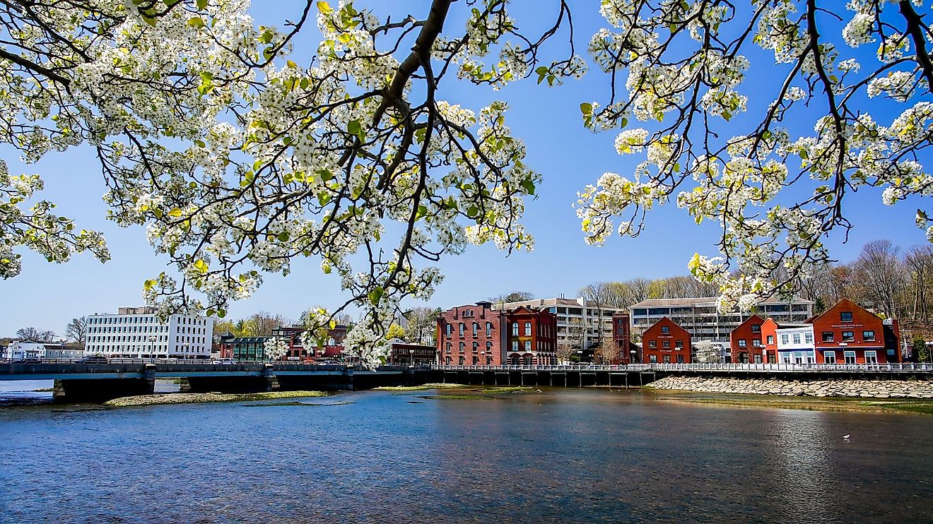 View from Westport bridge over Saugatuck River and architecture near downtown Westport, Connecticut on a beautiful spring day. Editorial credit: Miro Vrlik Photography / Shutterstock.com