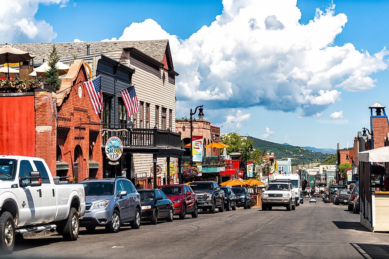Park City, USA - July 25, 2019: Ski resort town in Utah during summer with downtown colorful historic buildings and cars