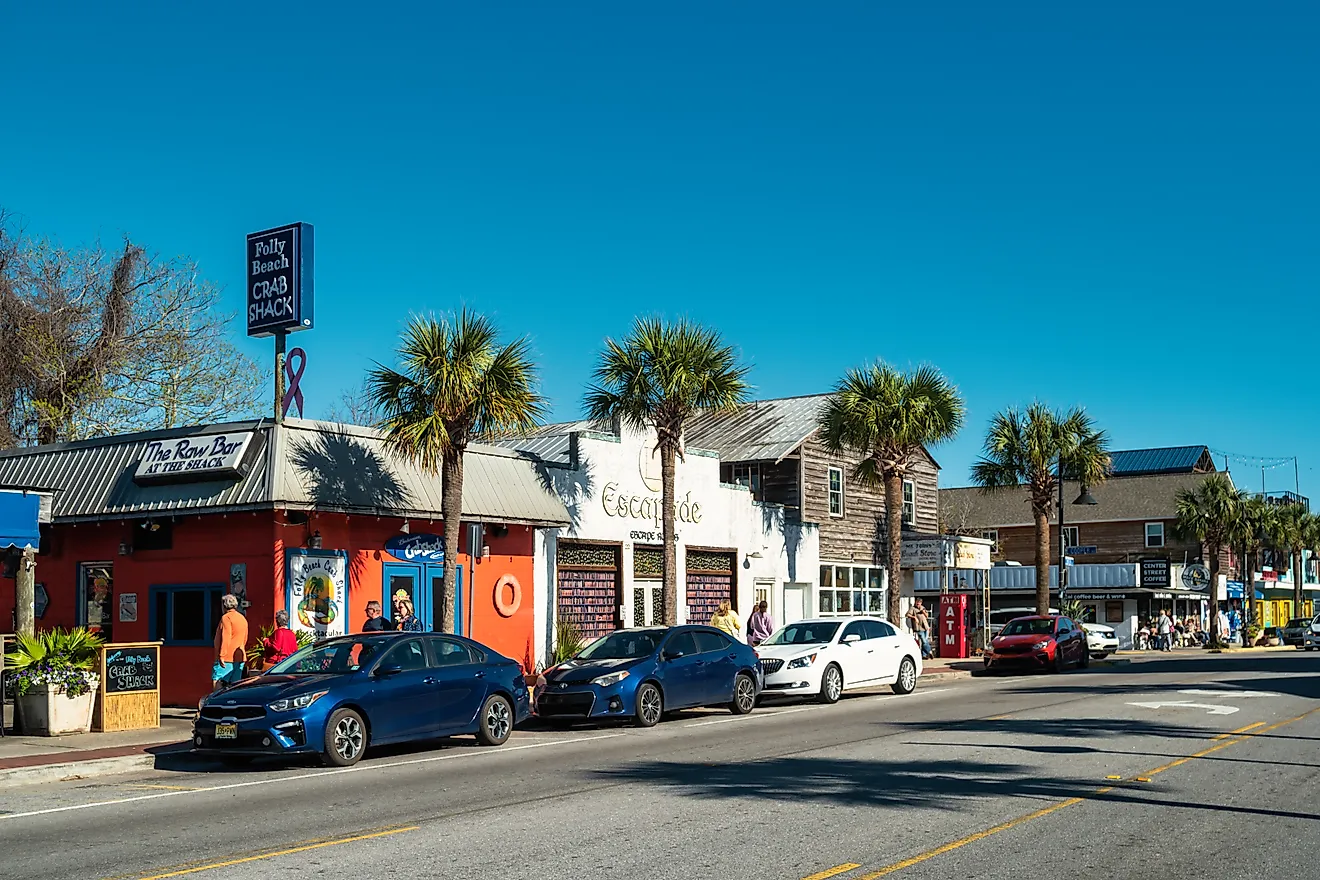 Pedestrians walk in downtown Folly Beach, South Carolina