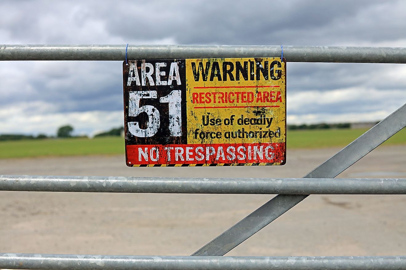 Area 51 Warning Sign Hanging On A Gate. Image credit: Dean Clarke/Shutterstock.com