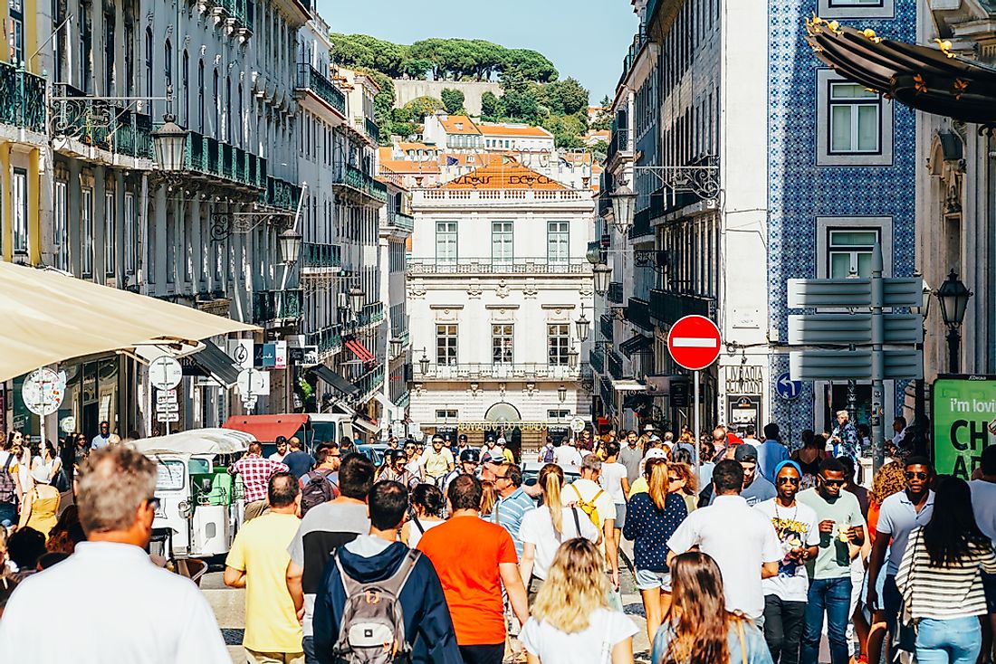 Busy street in Lisbon, Portugal. Editorial credit: Radu Bercan / Shutterstock.com