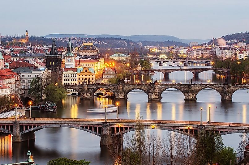 Beautiful view of Old Prague in springtime, with its iconic bridges stretching across the Vltava River.