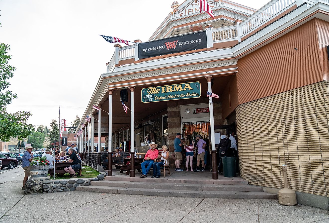 People gather outside the famous Irma Restaurant and grill in Cody, Wyoming. Image credit melissamn via Shutterstock