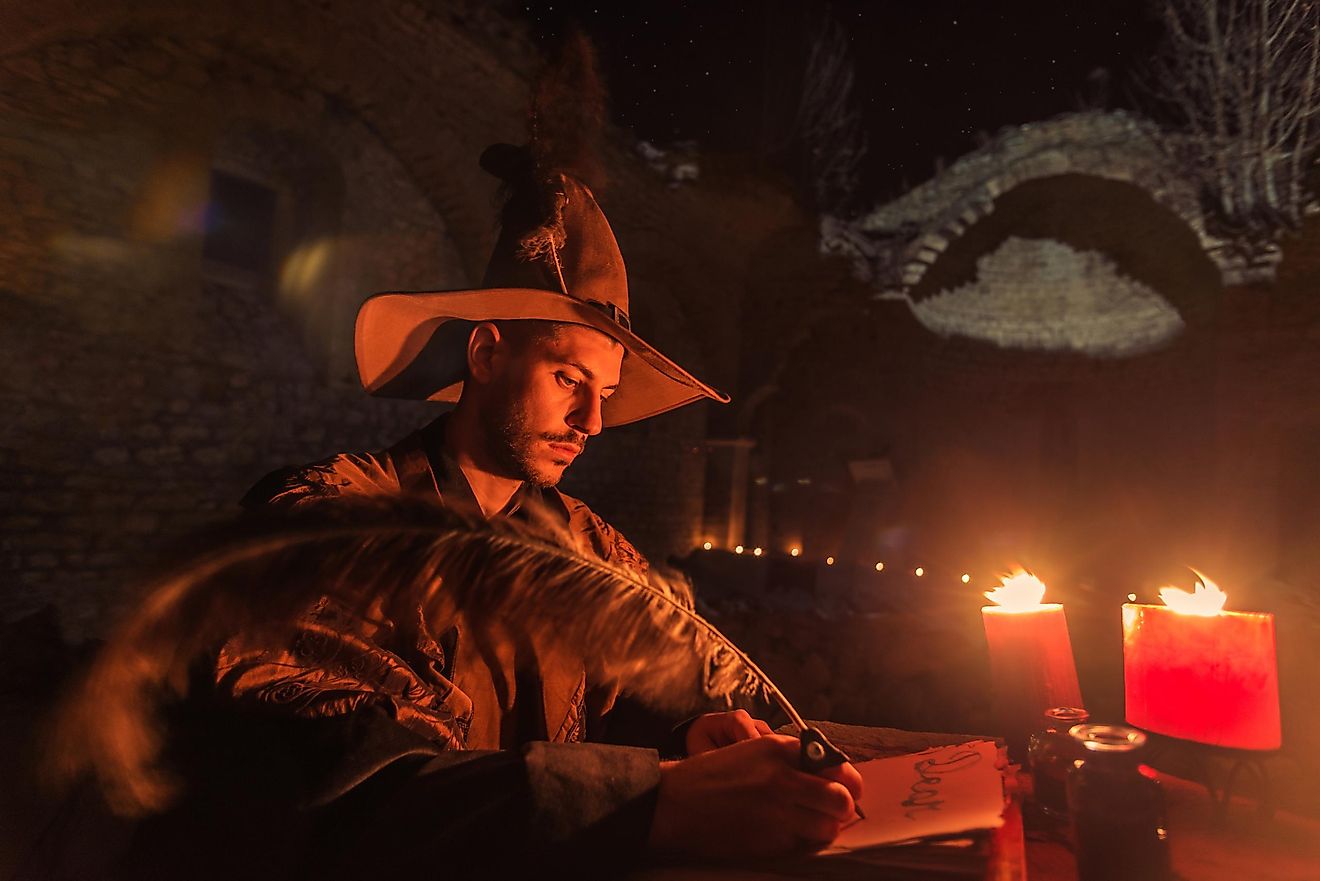 An actor playing the role of Nostradamus, the historically famous fortune teller.