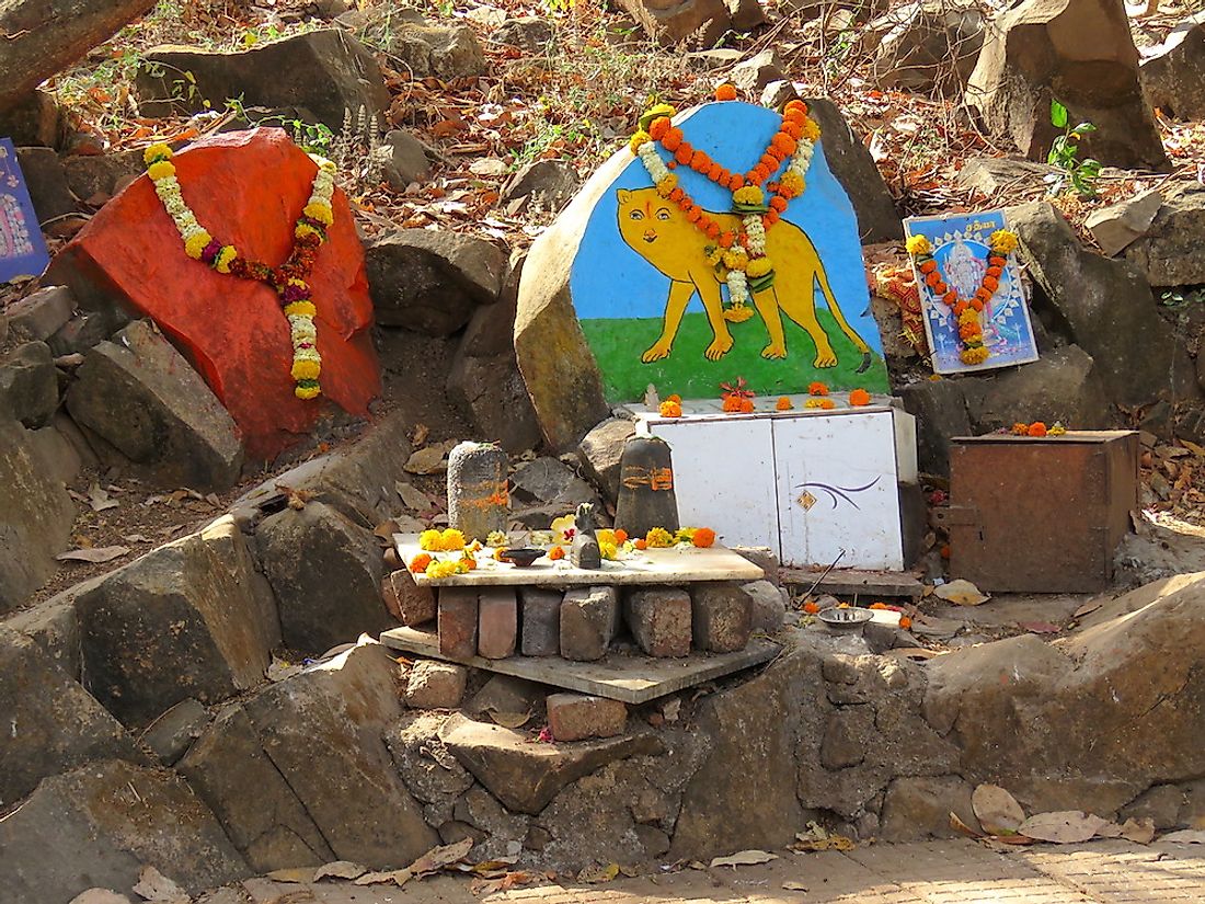 A Waghoba temple near SGNP with a big cat painted on stone. The painting is worshipped by the local people. Photo credit: World Atlas.