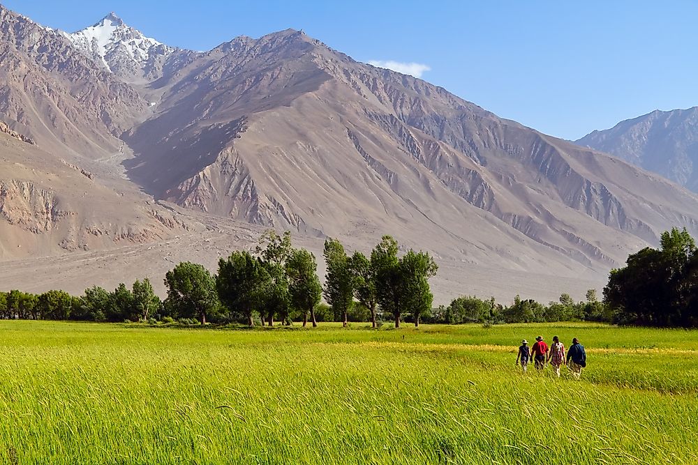 Tourists explore the Afghan Mountains.