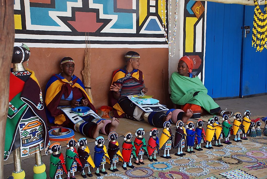 Ndebele women wear traditional handmade ornaments signifying marital status. Editorial credit: InnaFelker / Shutterstock.com