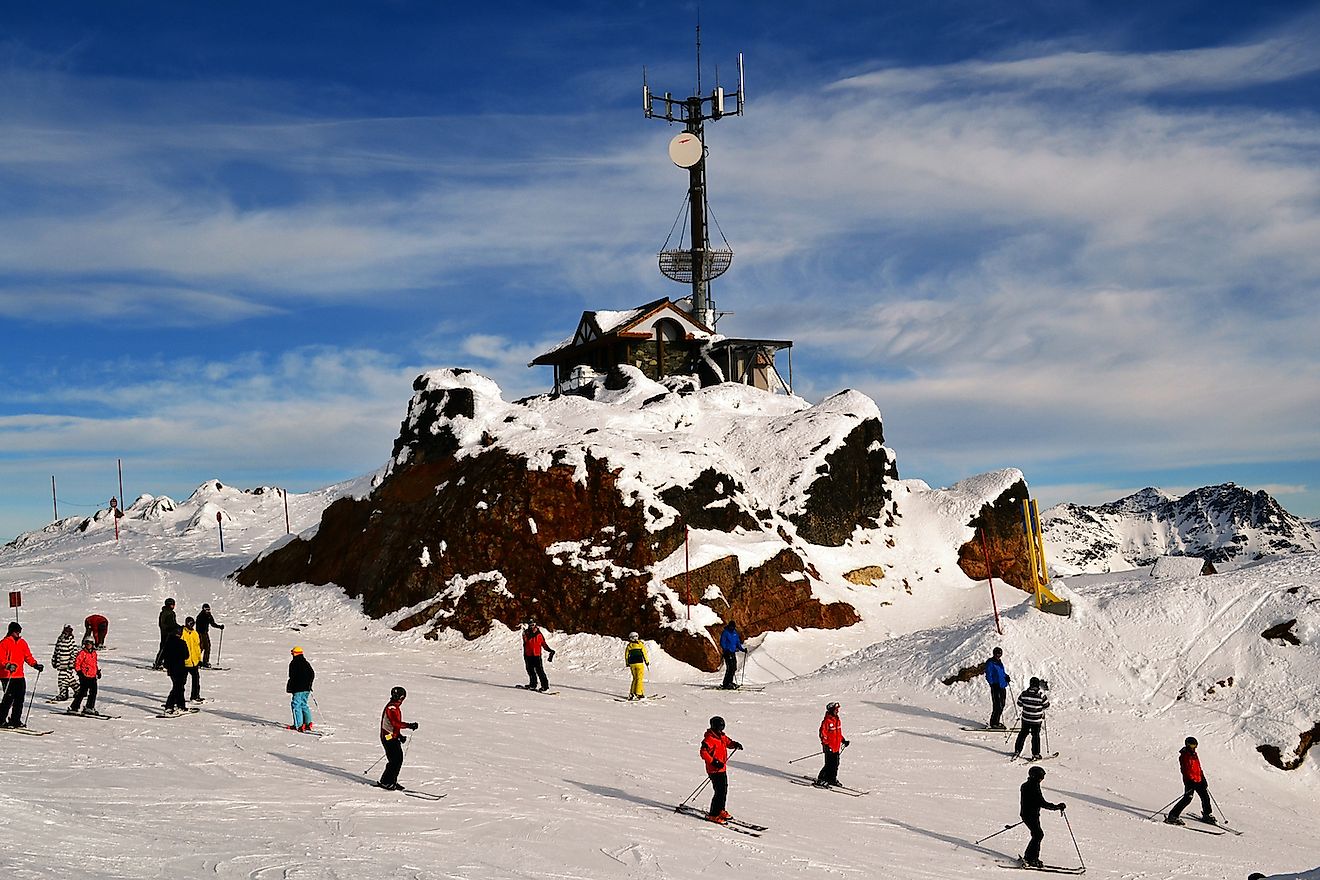 A group of people having fun skiing in Whistler. Image credit: Eug Png/Shutterstock.com