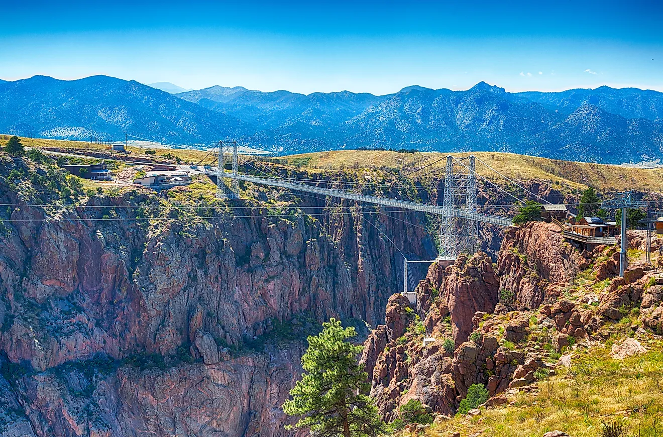 Royal gorge canyon and the associate suspension bridge draw tourists to Colorado. 