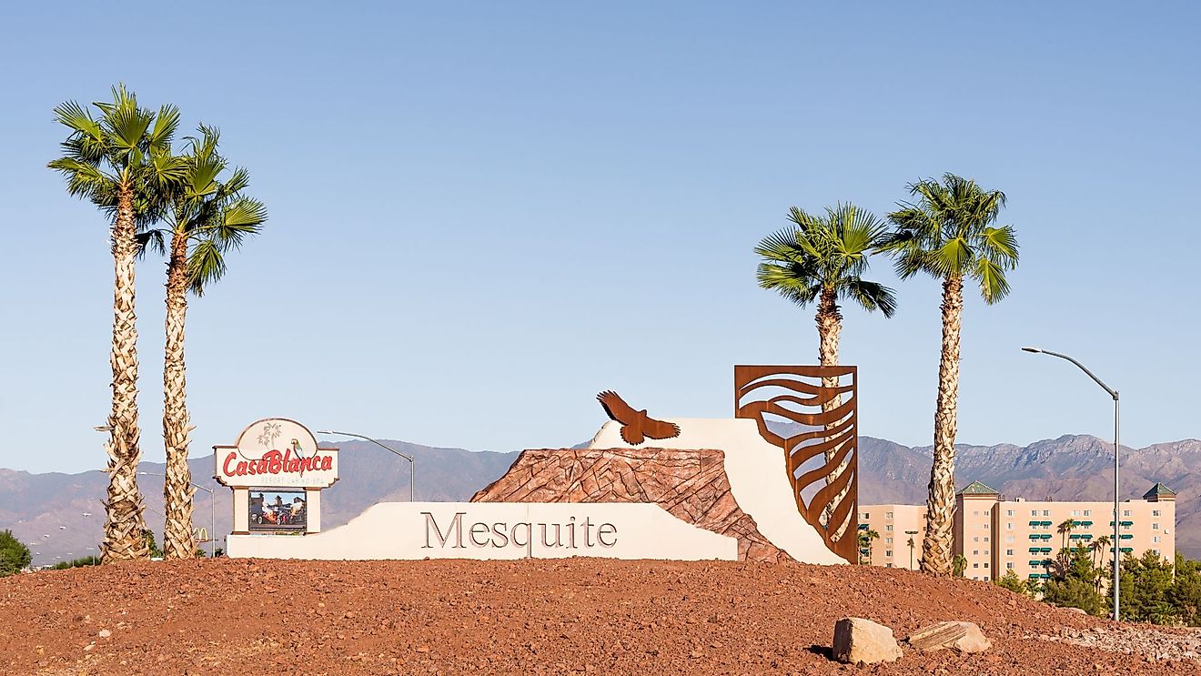 A Mesquite, Nevada welcome sculpture and palm trees fronts the Casa Blanca Resort & Casino. Editorial credit: Steve Lagreca / Shutterstock.com