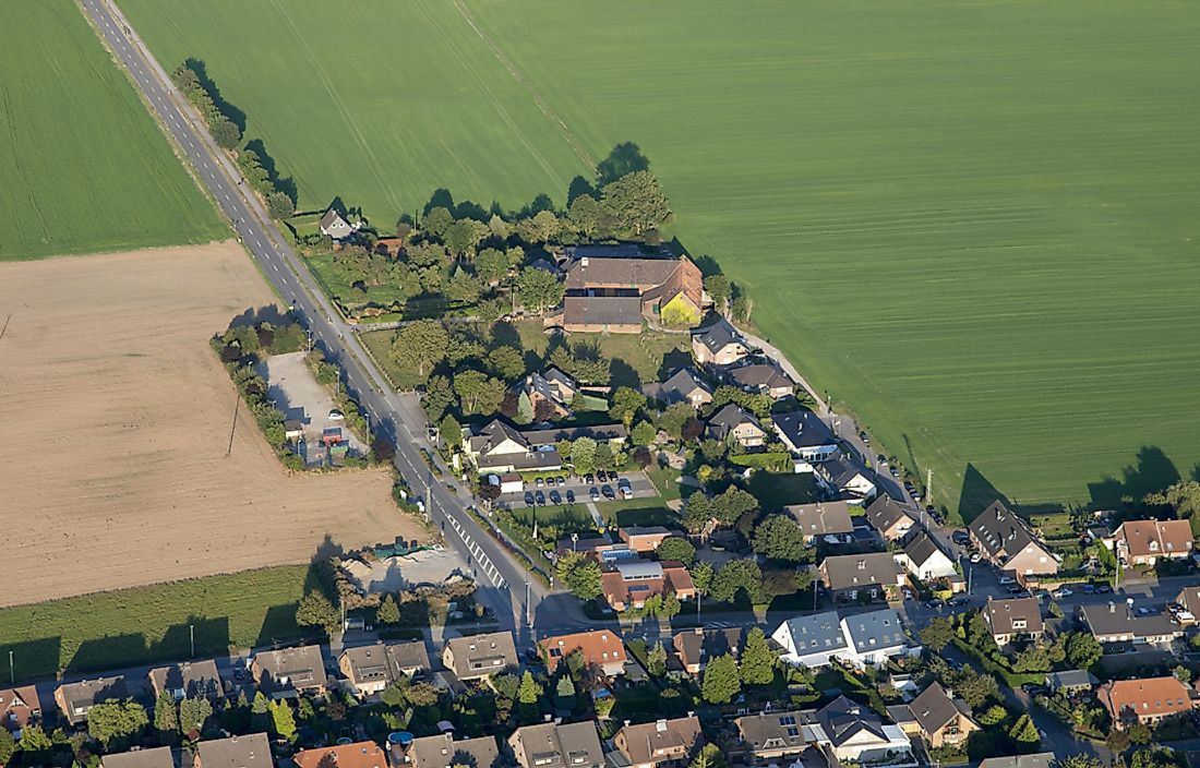 An aerial view of urban sprawl in a rural area of the Lower Rhine in Germany. 