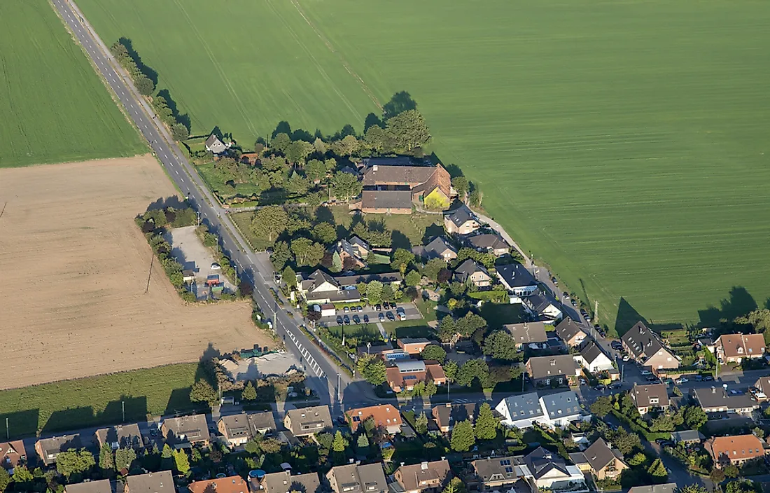 An aerial view of urban sprawl in a rural area of the Lower Rhine in Germany.