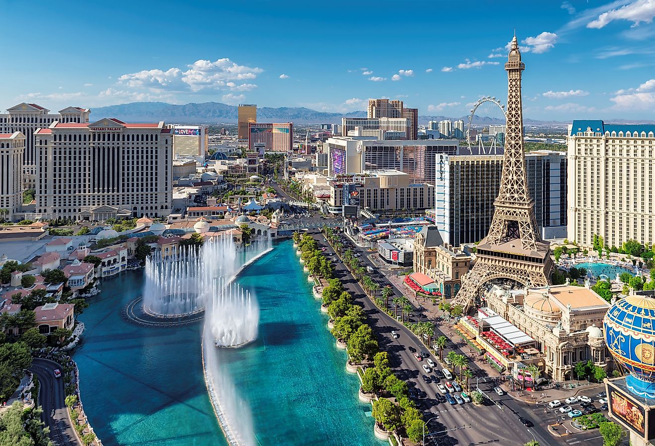 Aerial view of fountain show and Las Vegas strip in Nevada at sunset.