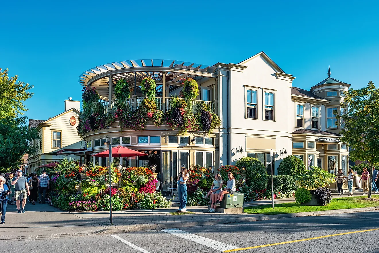 People enjoy a sunny day in downtown Niagara on the Lake, Ontario, Canada.