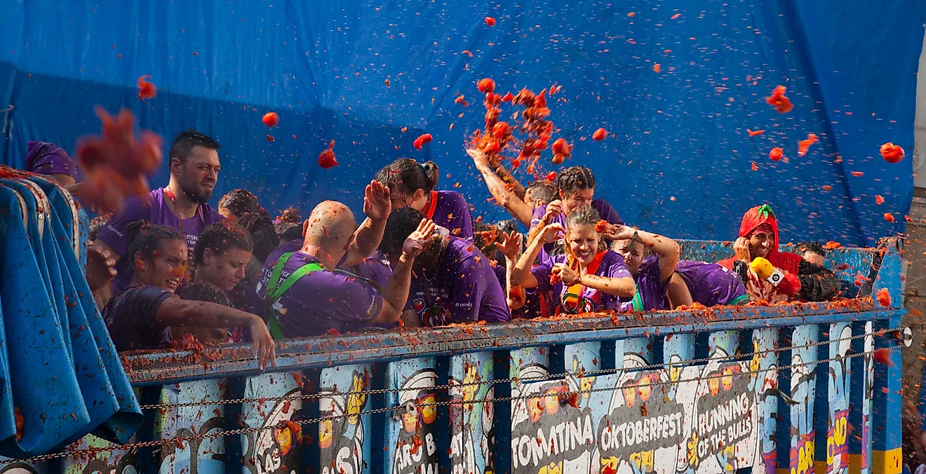  People during La Tomatina festival. Editorial credit: BearFotos / Shutterstock.com