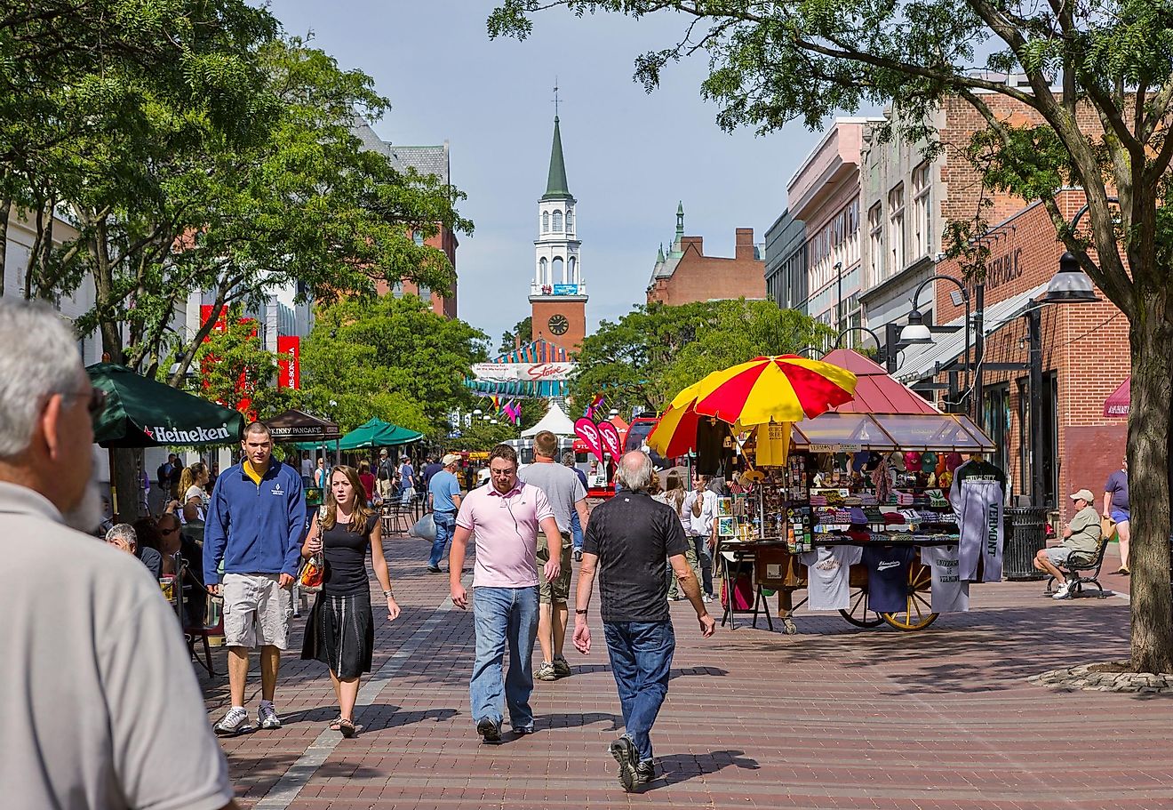 People on Church Street, a pedestrian mall with sidewalk cafes and restaurants.