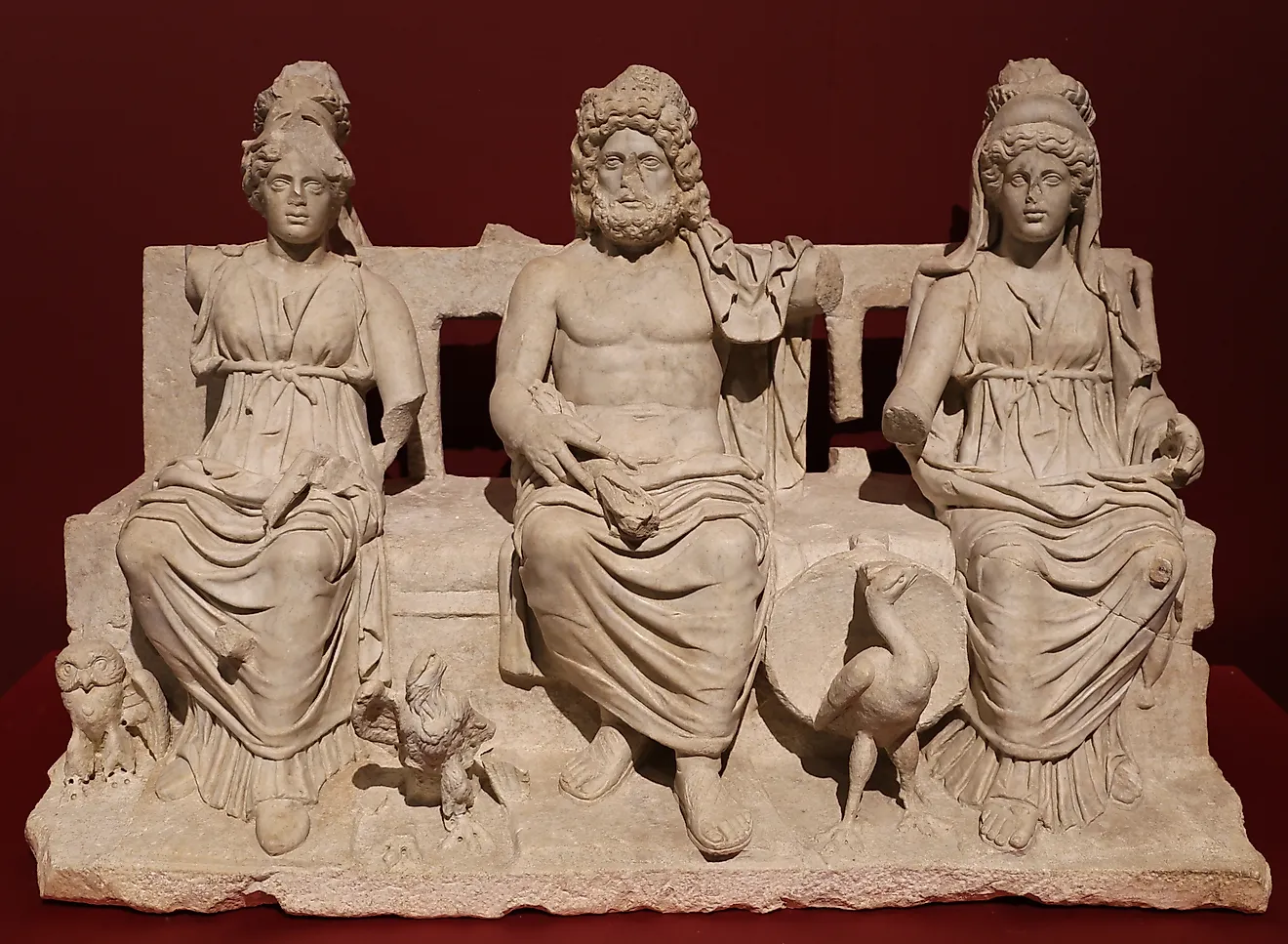 Capitoline Triad of Juno, Jupiter, and Minerva, ancient Roman deities.
