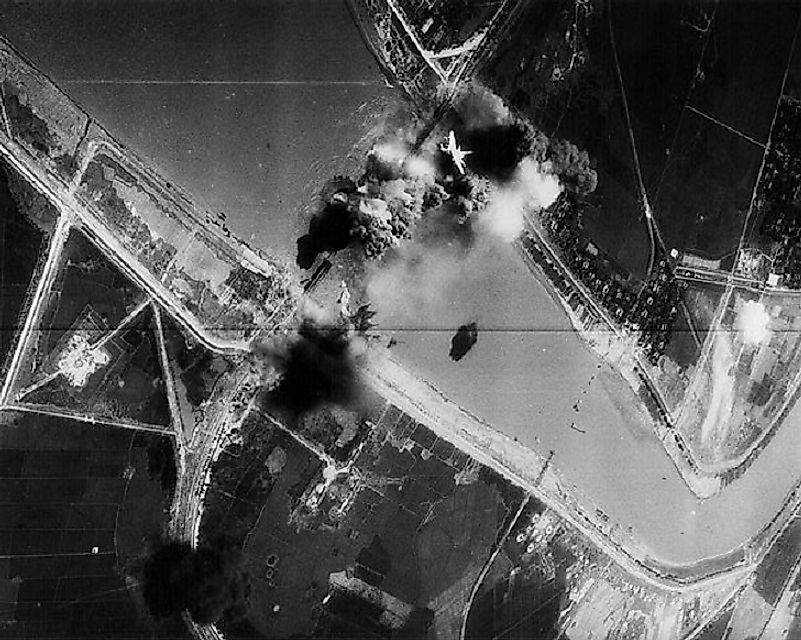 U.S. Air Force planes bombing a strategic North Vietnamese bridge.