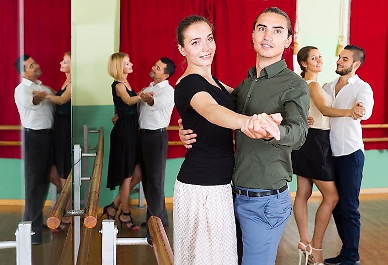 Couples attending a ballroom dancing class.
