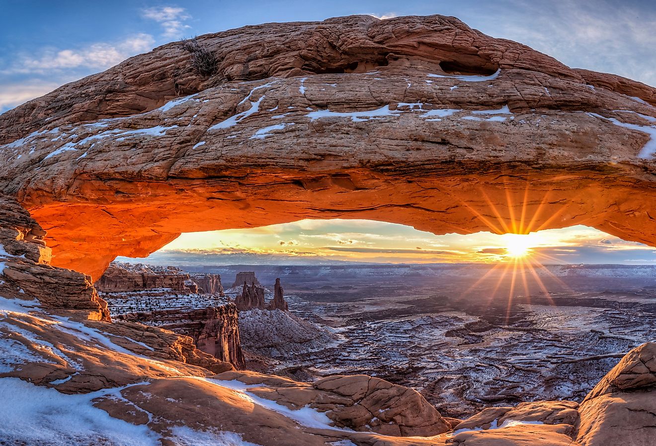 The winter sun rises on a cold January morning at Mesa Arch in Canyonlands National Park, Utah. Image credit Colin D. Young via Shutterstock